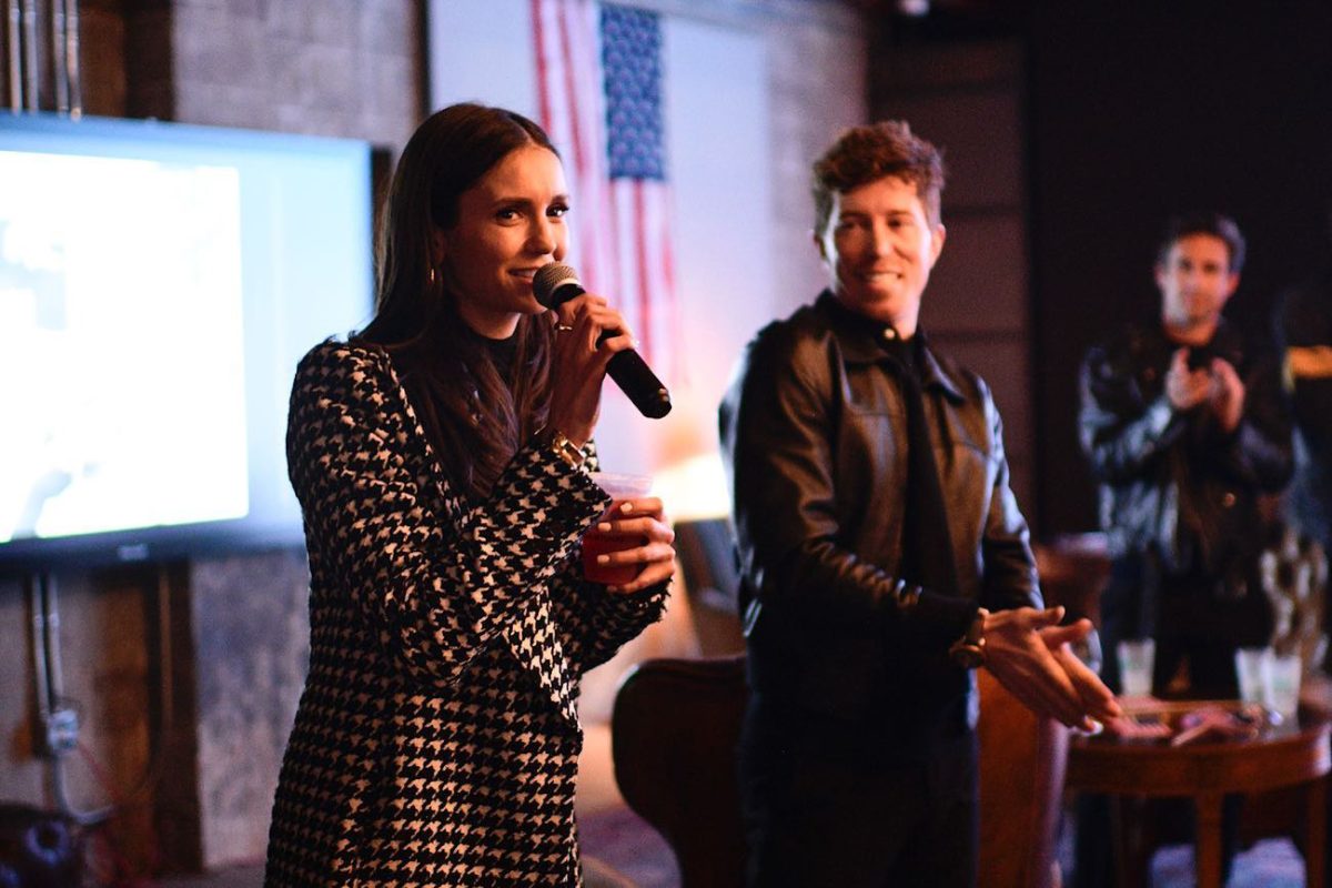 Nina Dobrev kisses Shaun White while celebrating his retirement