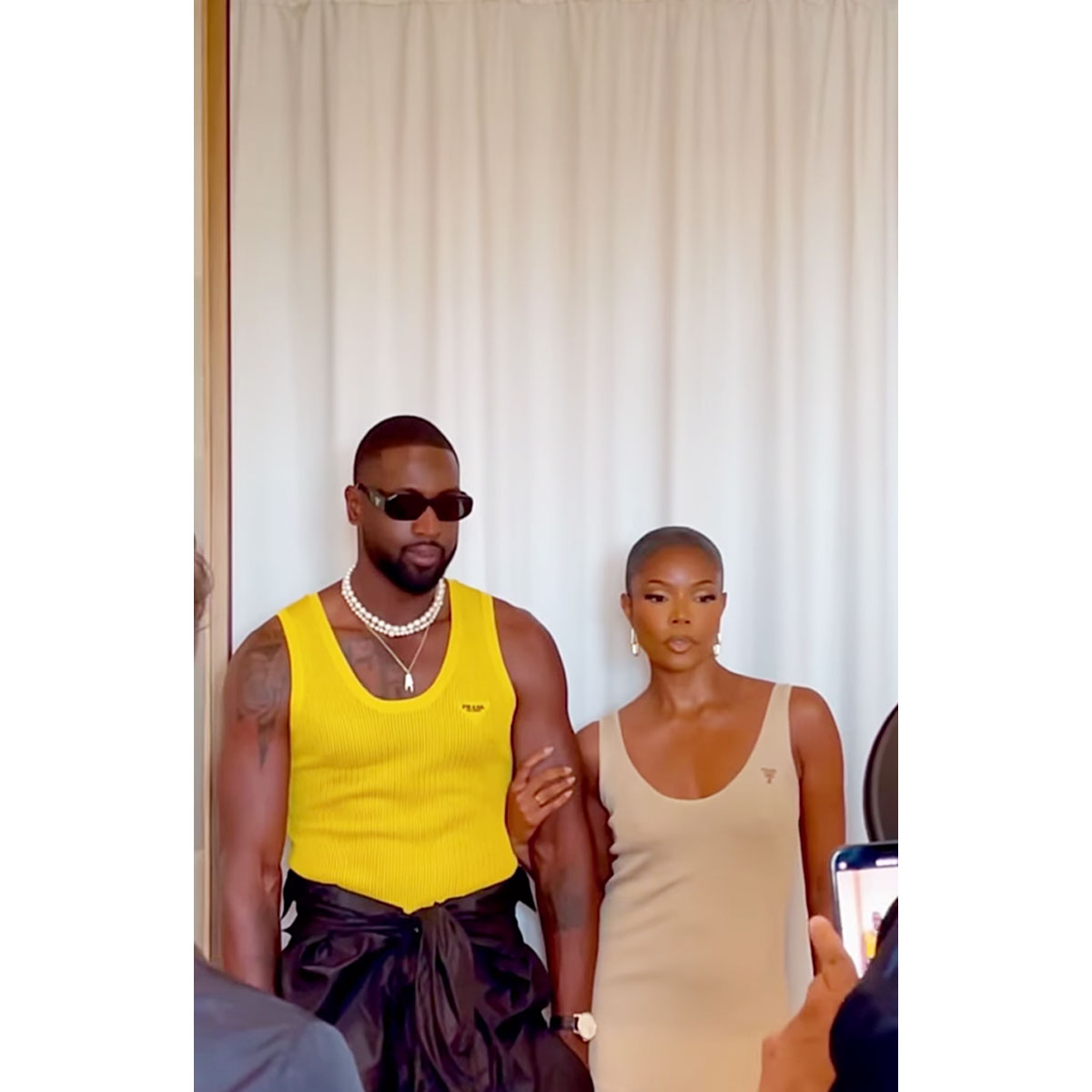 Gabrielle Union and Dwyane Wade Wear Mesh Outfits at Prada Show