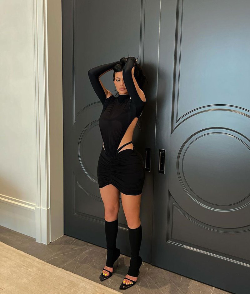 Kylie Jenner Wears Cutout Dress With Leg Warmers and Sandal Heels | Us ...