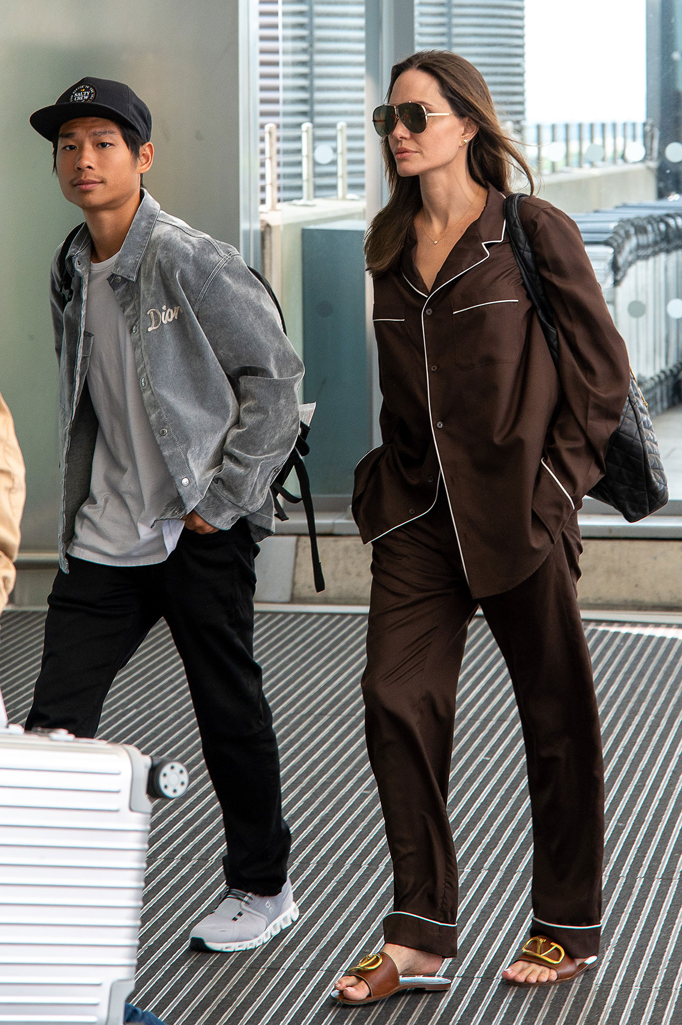 Angelina Jolie Wears Valentino Pajamas to the Airport: Photos