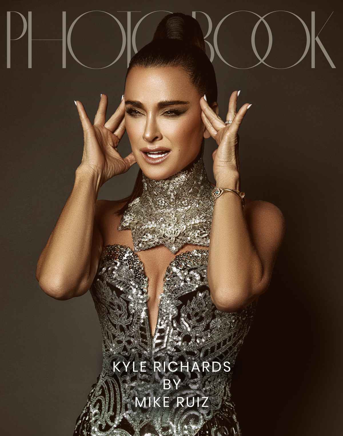 Kyle Richards covers magazine wearing nothing but bling