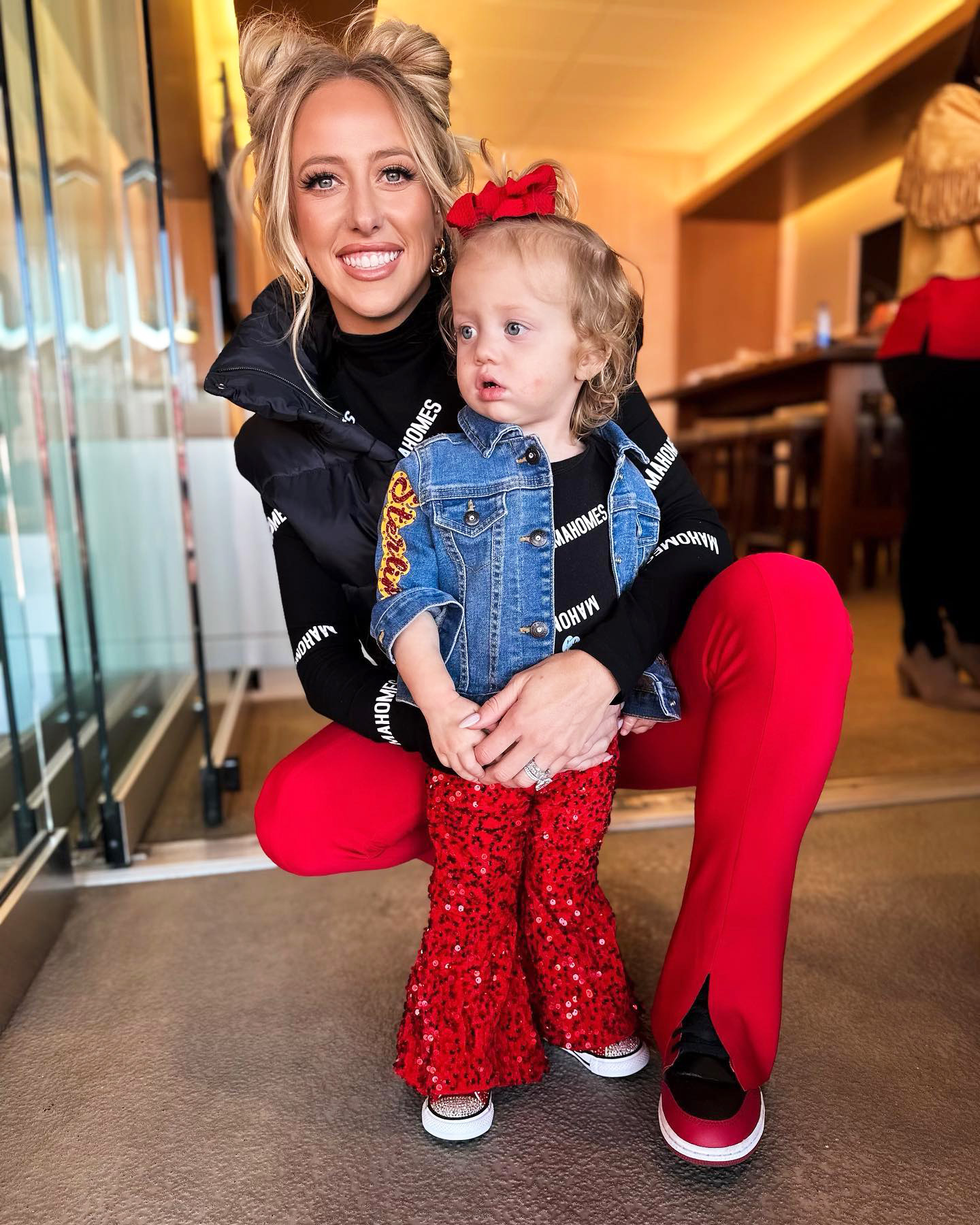 Brittany Matthews, daughter wear Chiefs red for Super Bowl 2023