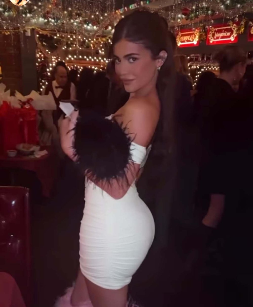 Kylie Jenner Shows Off Her Curves In Feathered White Mini Dress