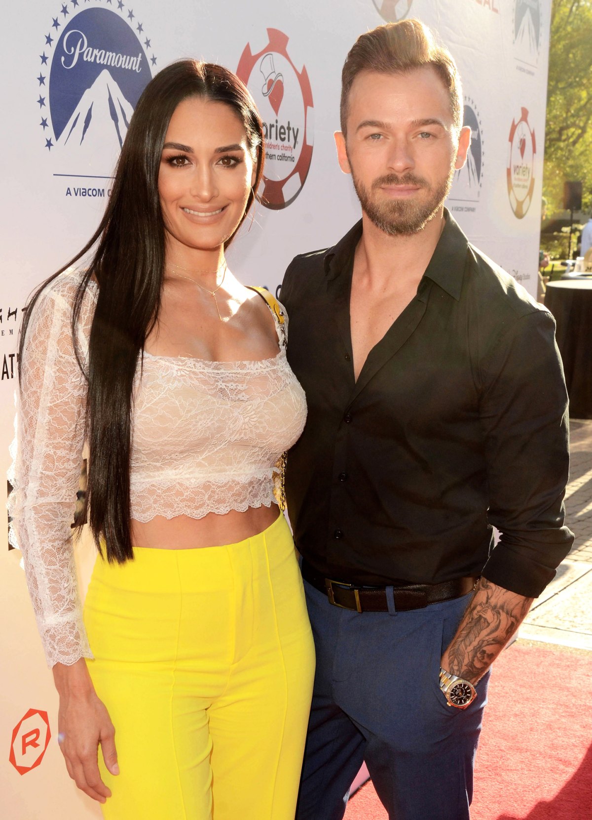 Nikki Bella wears white as she weds fiancé Artem Chigvintsev in