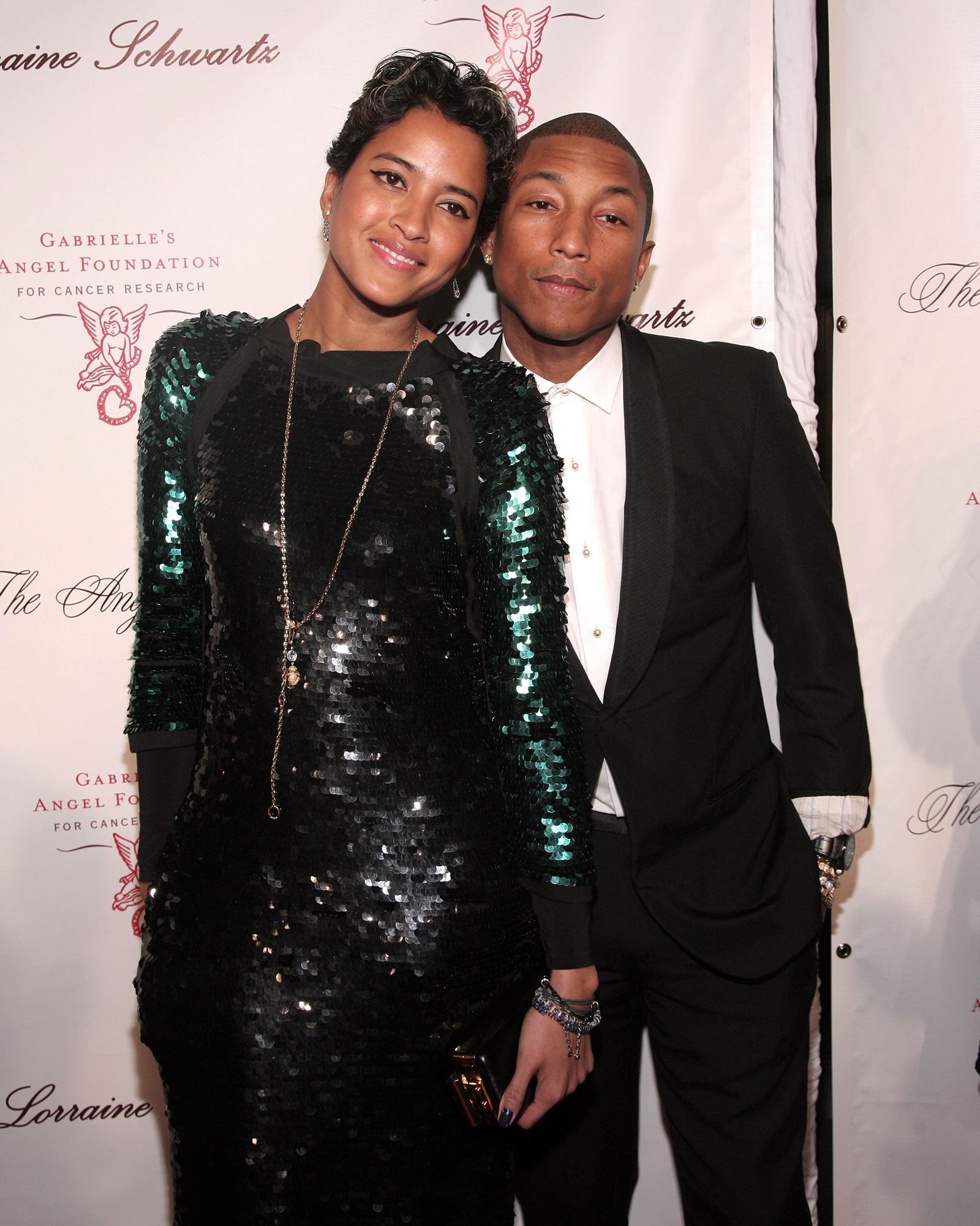 Pharrell Williams and his wife Helen Lasichanh put on a stylish