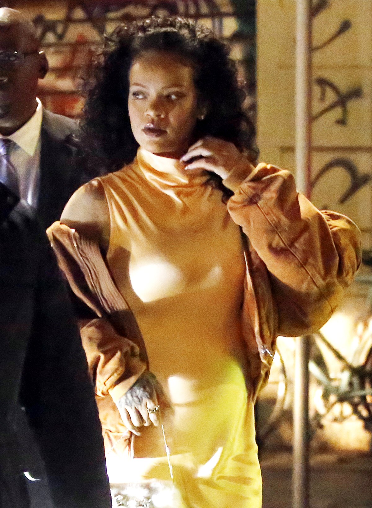 Rihanna in Orange Suit