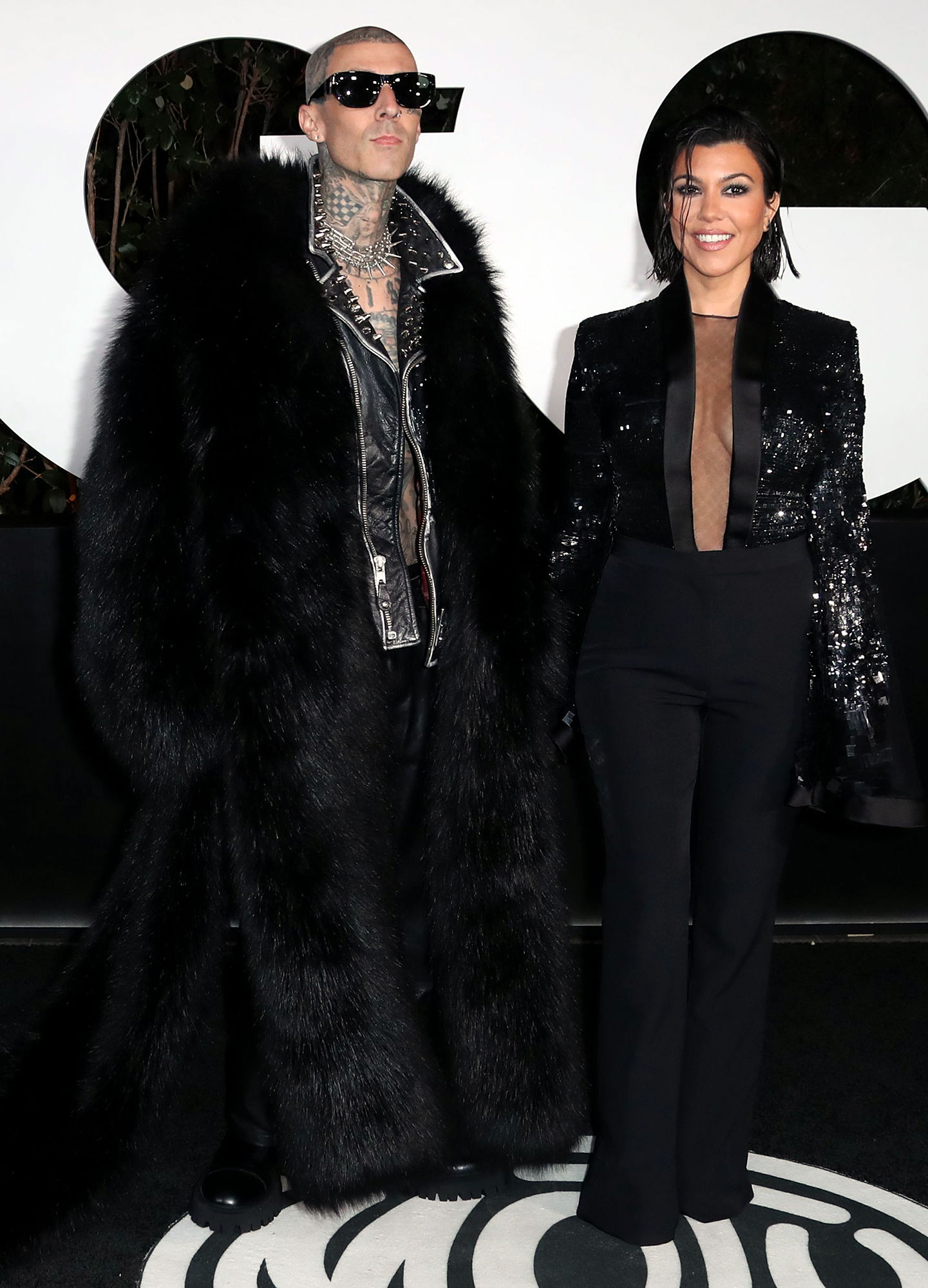 Kourtney Kardashian steps out in chic fur coat as she and Travis