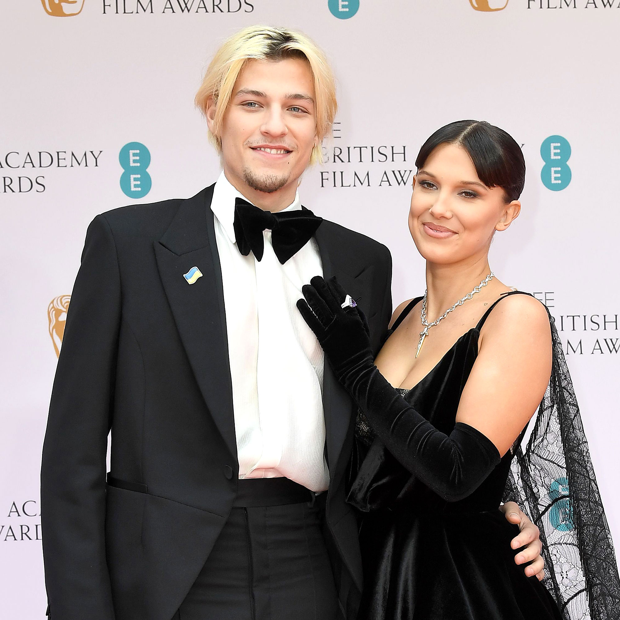 Millie Bobby Brown & Jake Bongiovi Make Red Carpet Debut At 2022 BAFTAs -  Access