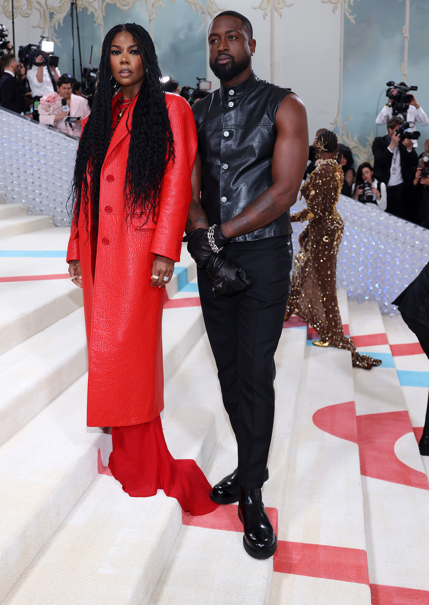 Feature Gabrielle Union Captivates In Crimson At 2023 Met Gala Poses With Husband Dwyane Wade ?w=1419&quality=86&strip=all