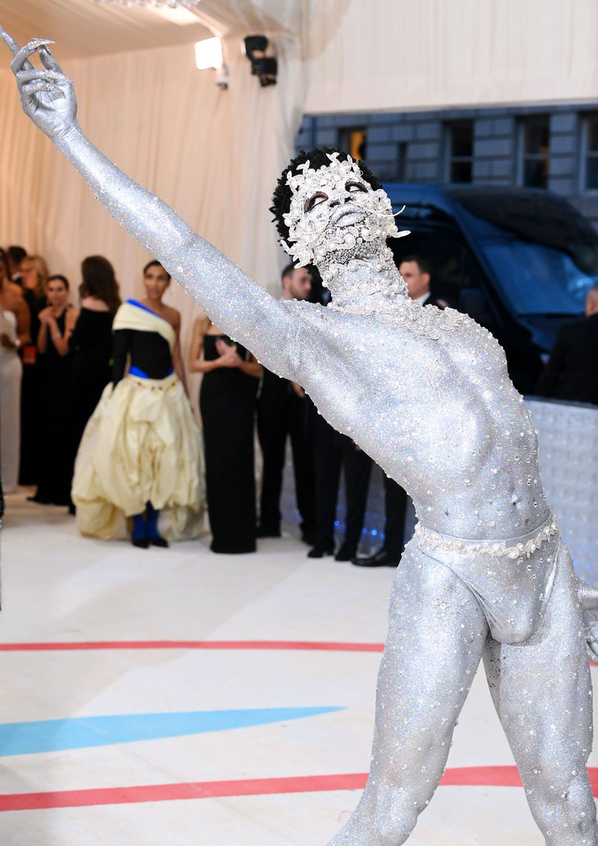 Lil Nas X is nearly naked and covered in crystals on Met Gala 2023 red