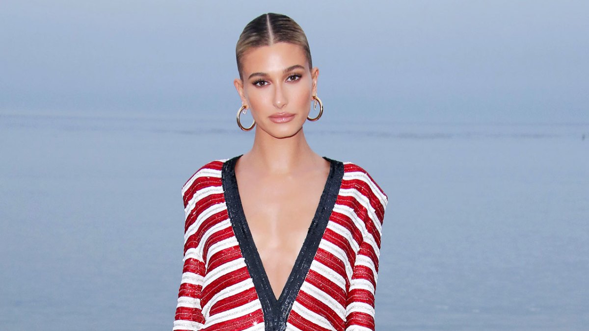 Hailey Bieber glitters in pink minidress for Rhode party