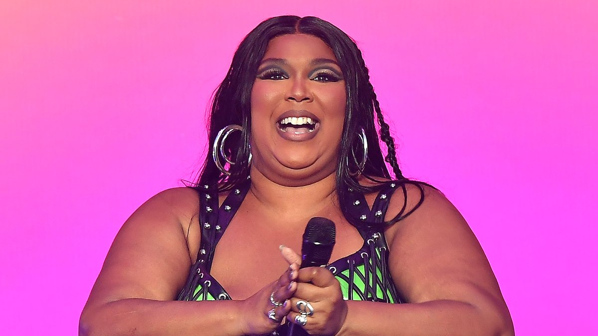 Lizzo Gets Cheeky in a Tiny Thong Swimsuit: Photos
