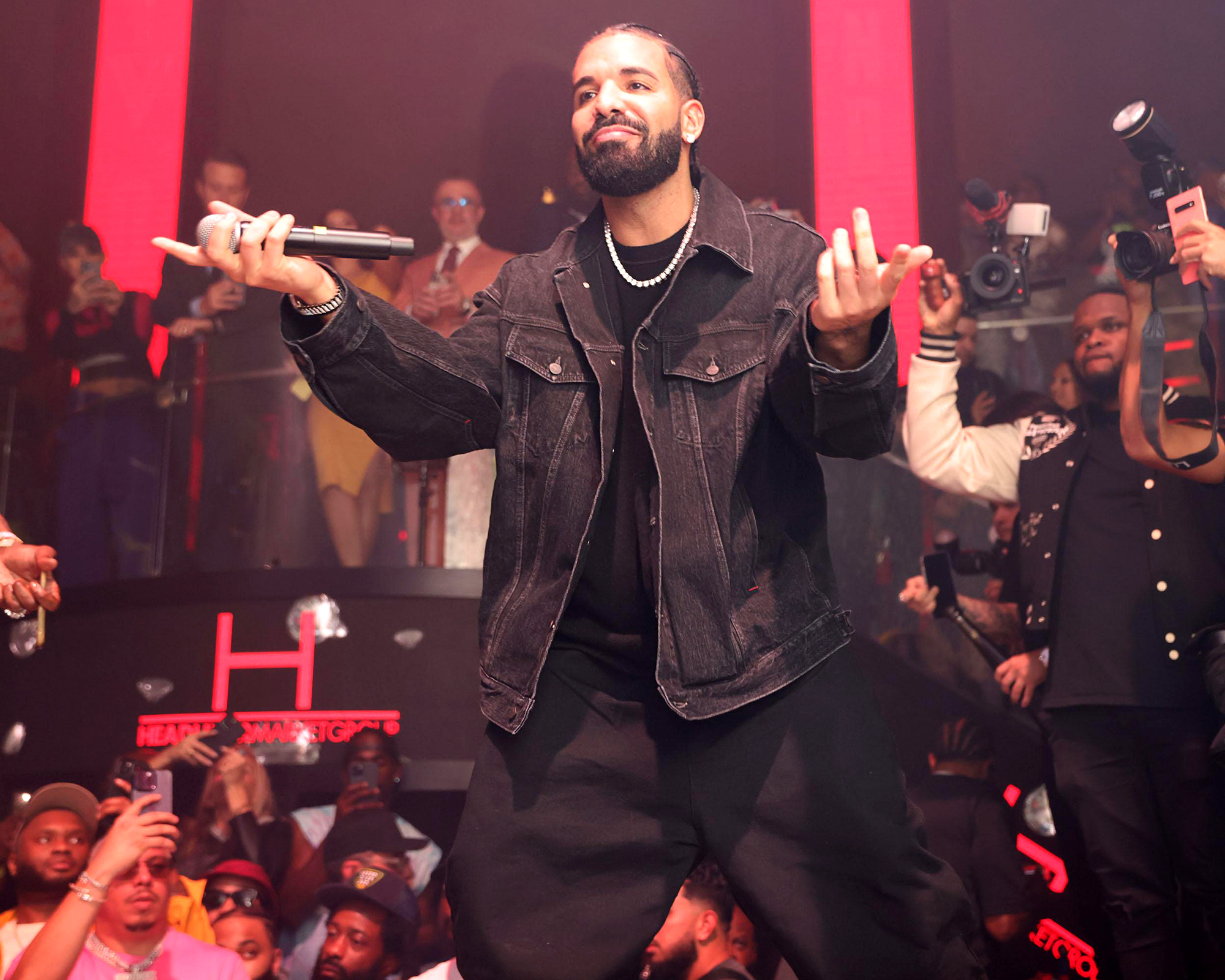 Drake's viral concert moment: the rapper gets covered in bras and