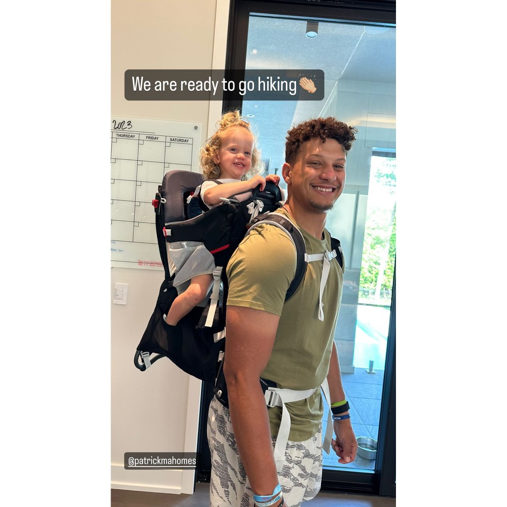 Patrick Mahomes Wears Daughter in Hiking Backpack Ahead of Family Travels