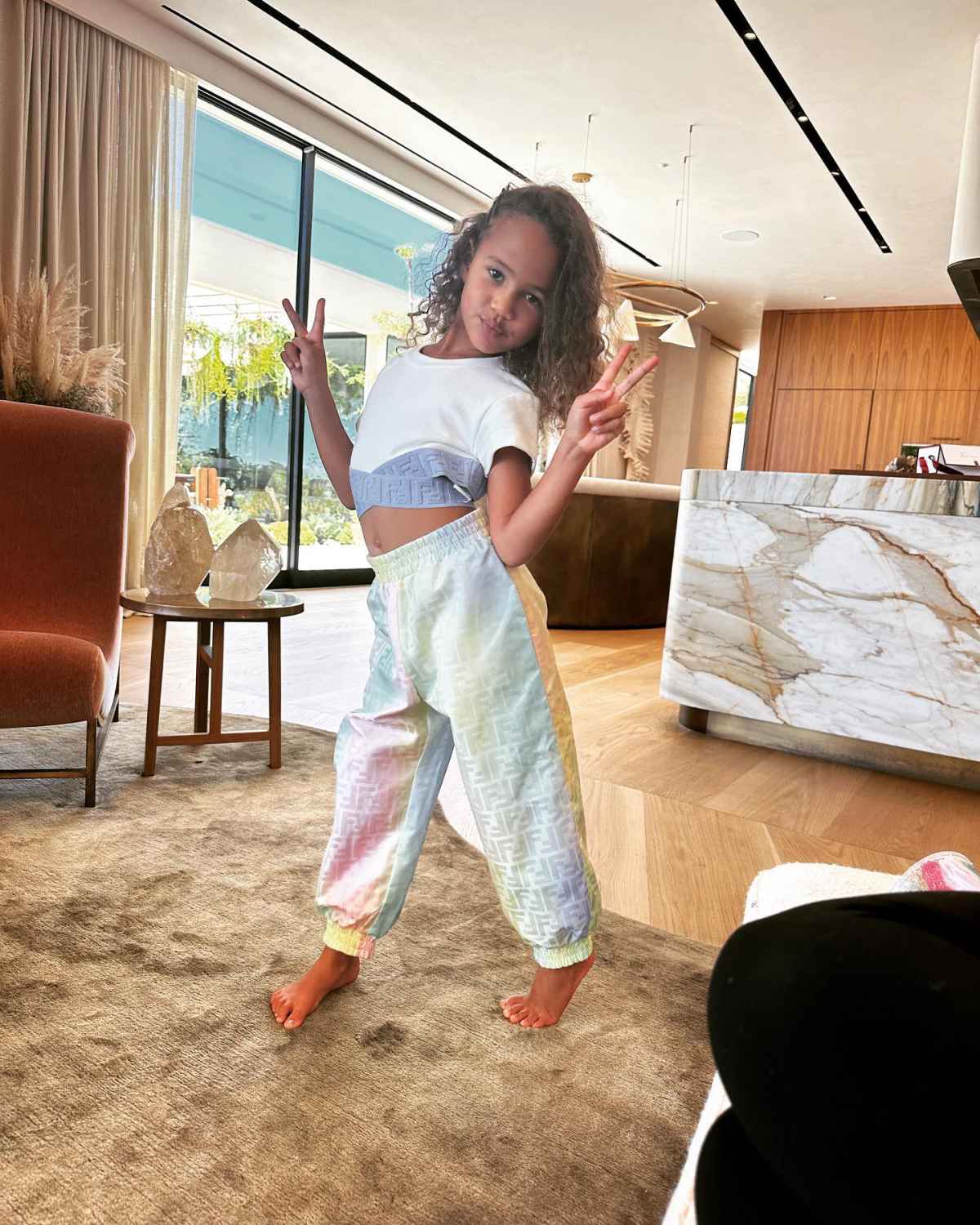 Chrissy Teigens Daughter Luna Wears Fendi Workout Outfit Photo Us Weekly 