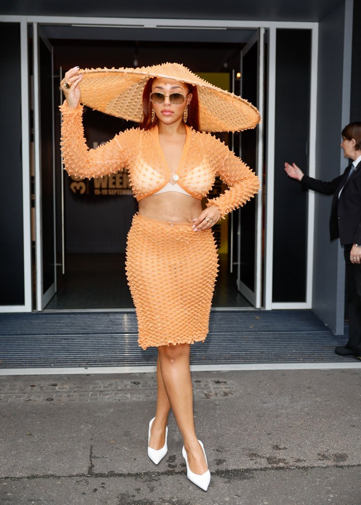 Jordyn Woods Looks Epic in Orange Popcorn Getup During London Fashion Week