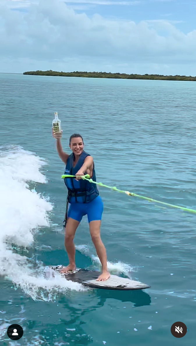 Kim Kardashian Keeps Kendall Jenner's 818 Tequila Safe After Wiping Out on a Wakeboard