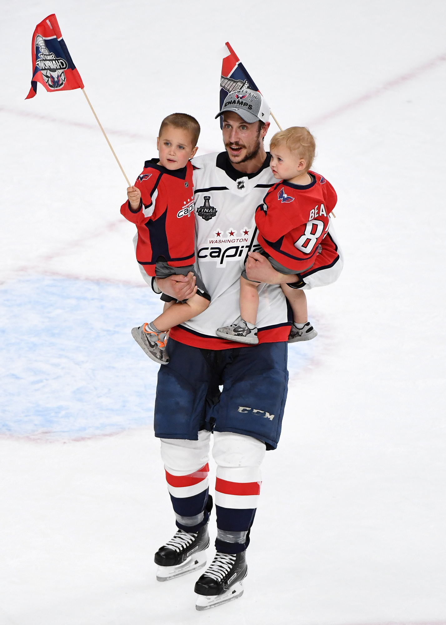 A family poses with their baby in the Stanley Cup during its visit to  News Photo - Getty Images