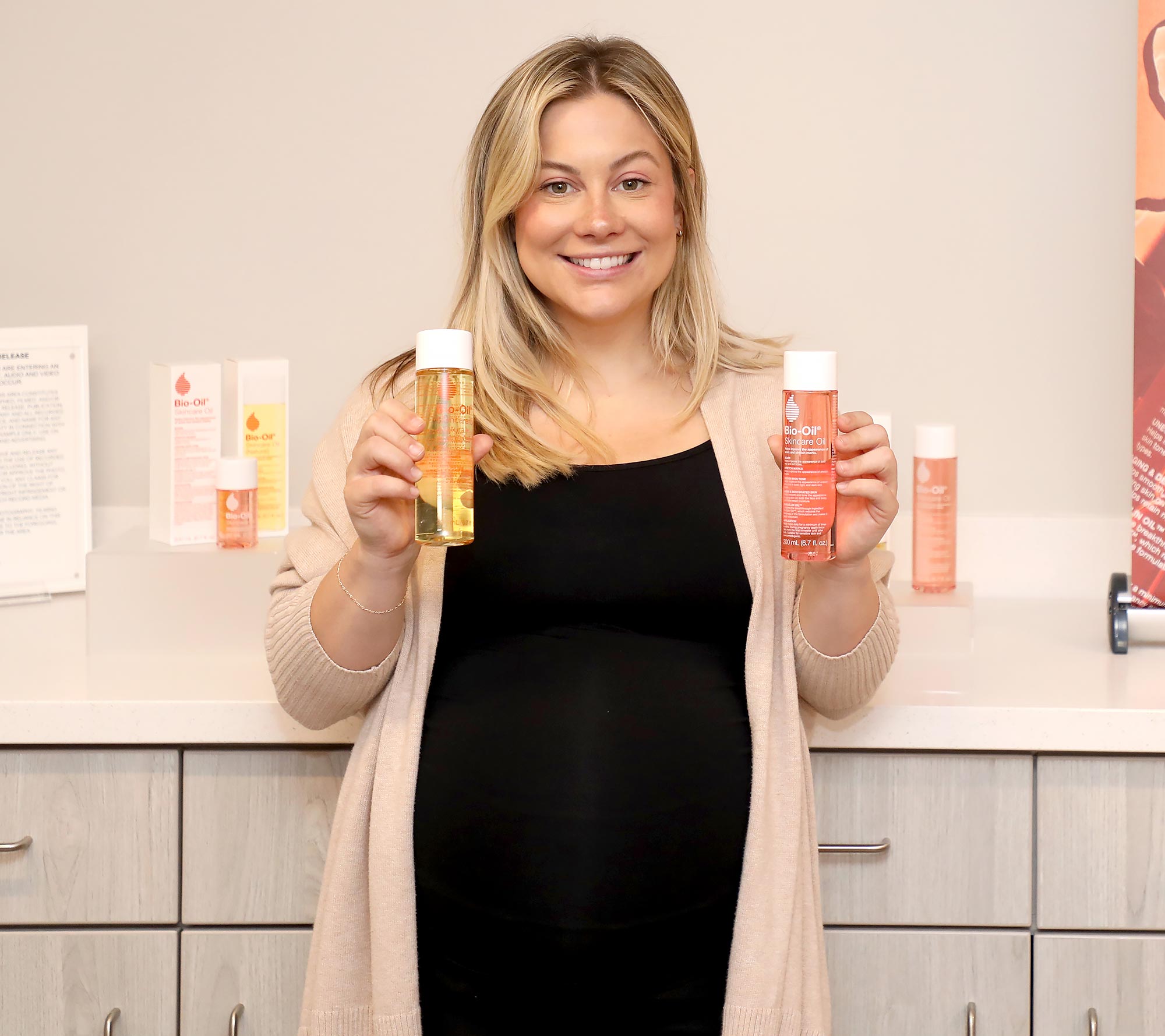 https://www.usmagazine.com/wp-content/uploads/2023/10/Shawn-Johnson-Credits-Bio-Oil-for-Helping-Keep-Her-Pregnant-Belly-Stretch-Mark-Free1.jpg?quality=86&strip=all
