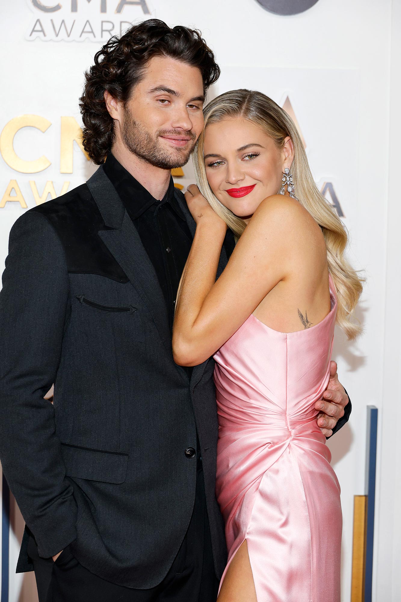 Kelsea Ballerini and Chase Stokes Embrace 2023 CMA Awards Red Carpet as