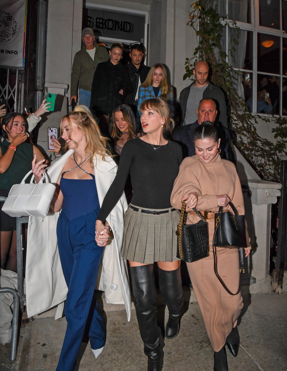 Taylor Swift's Cozy All-Black Outfit: Shop Turtleneck Sweater Dresses