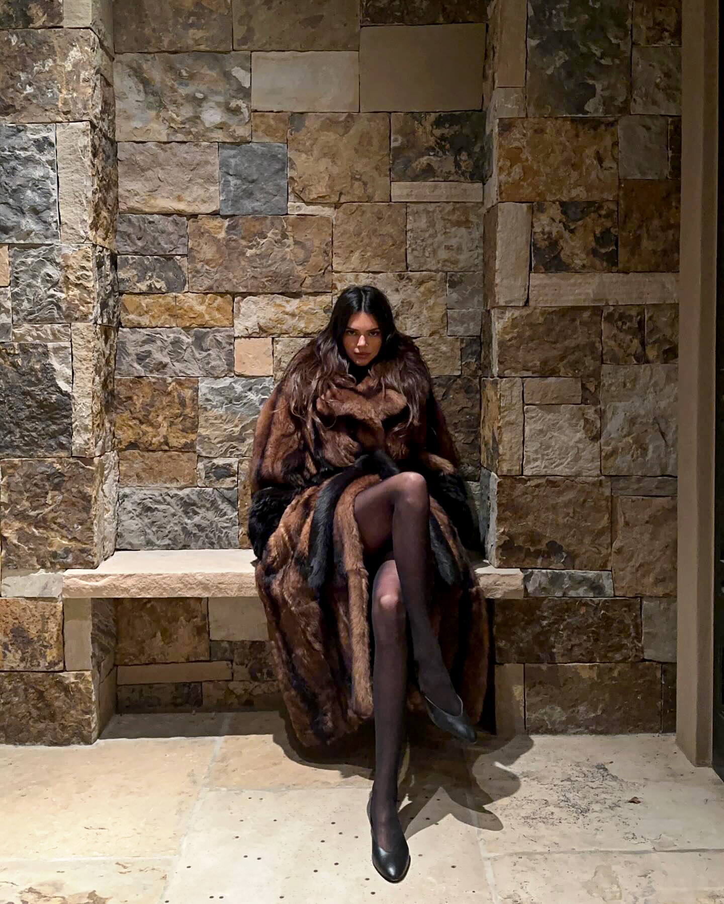 Kendall Jenner bundles up in $27K fur coat on solo Aspen trip amid Bad  Bunny split