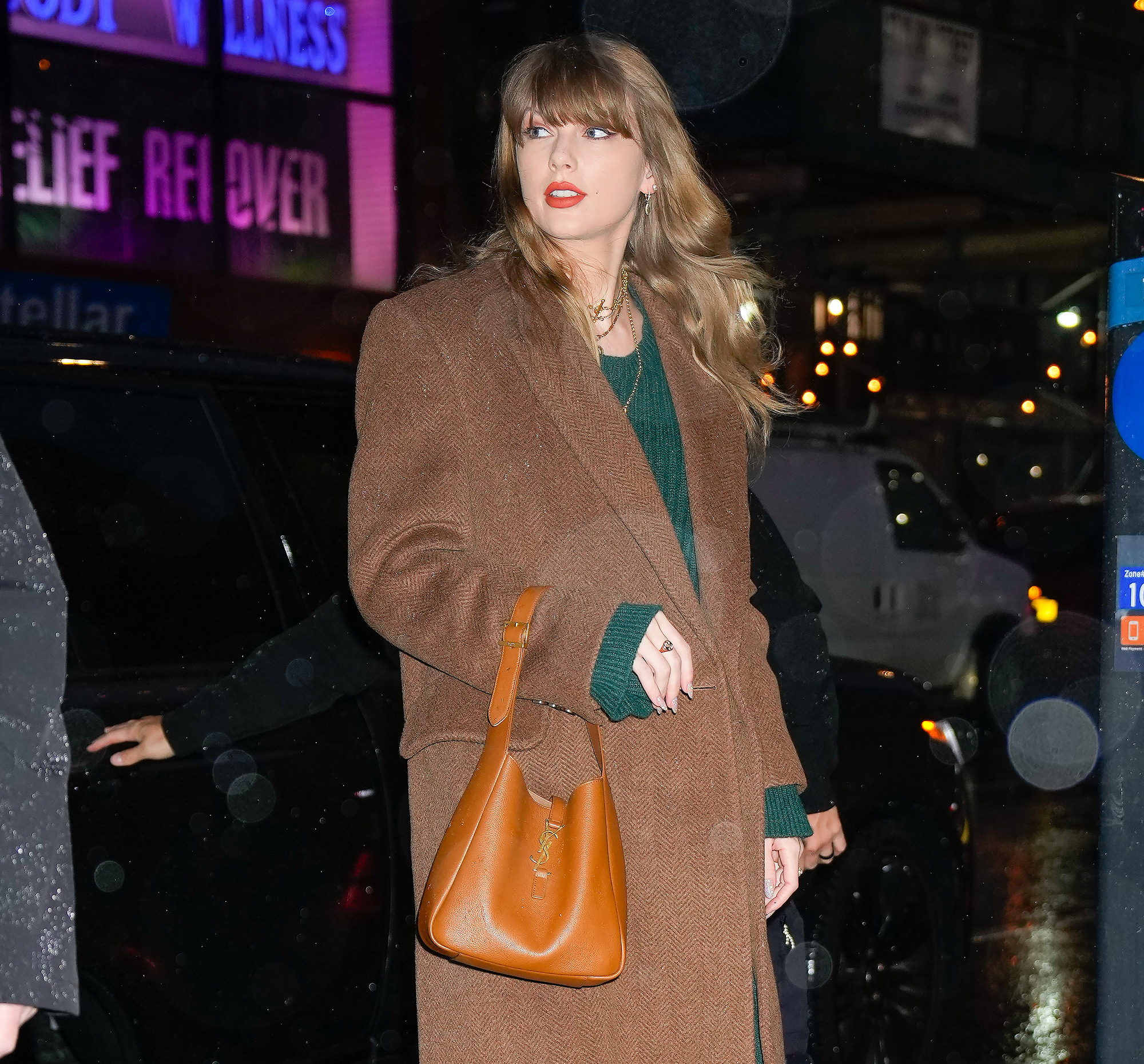 Taylor Swift Stuns in Green Sweater Dress in NYC Post Golden Globes