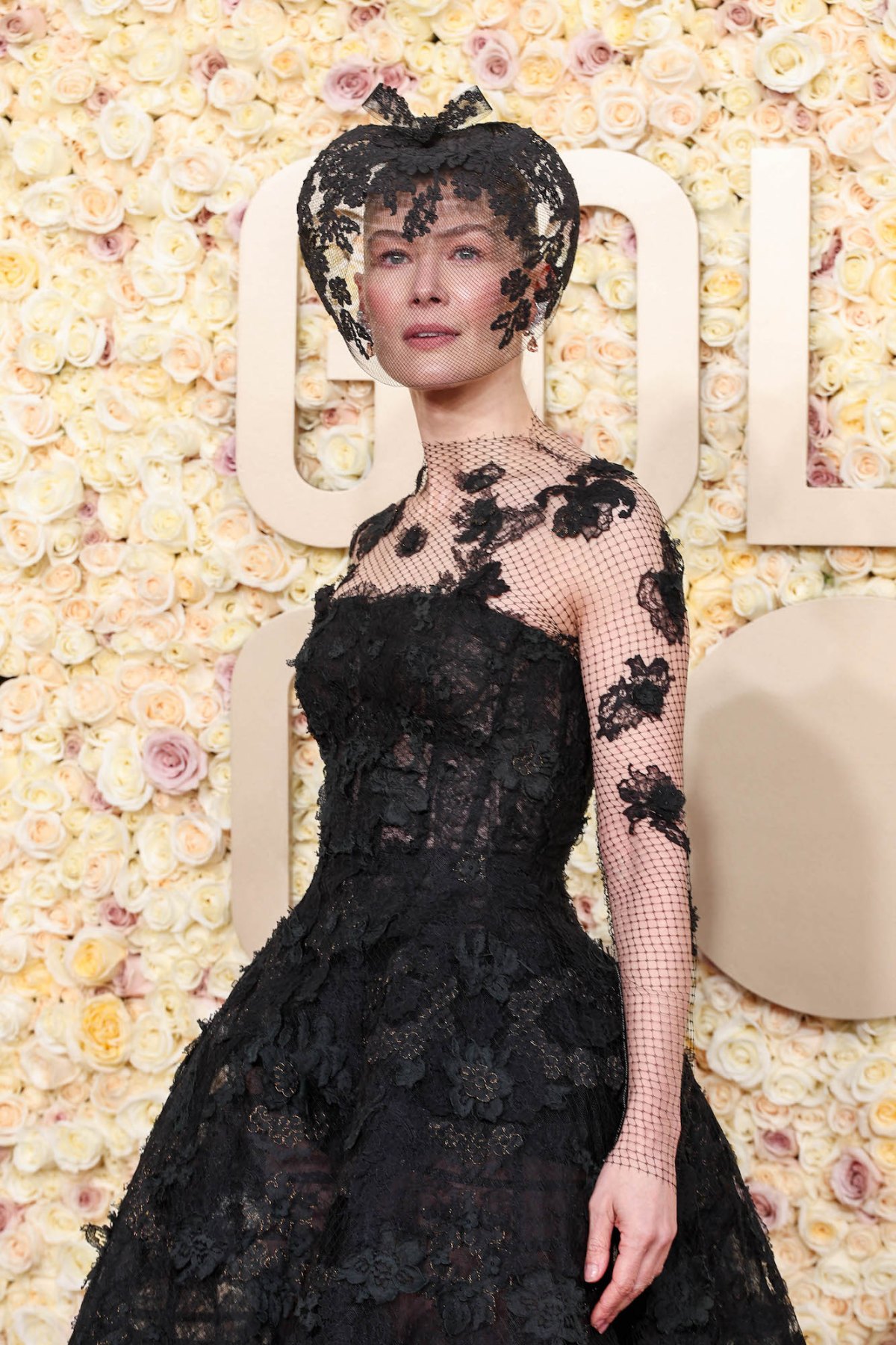 Rosamund Pike Wears Dior Veil At 2024 Golden Globes After Ski Accident 1 ?w=1200&quality=86&strip=all