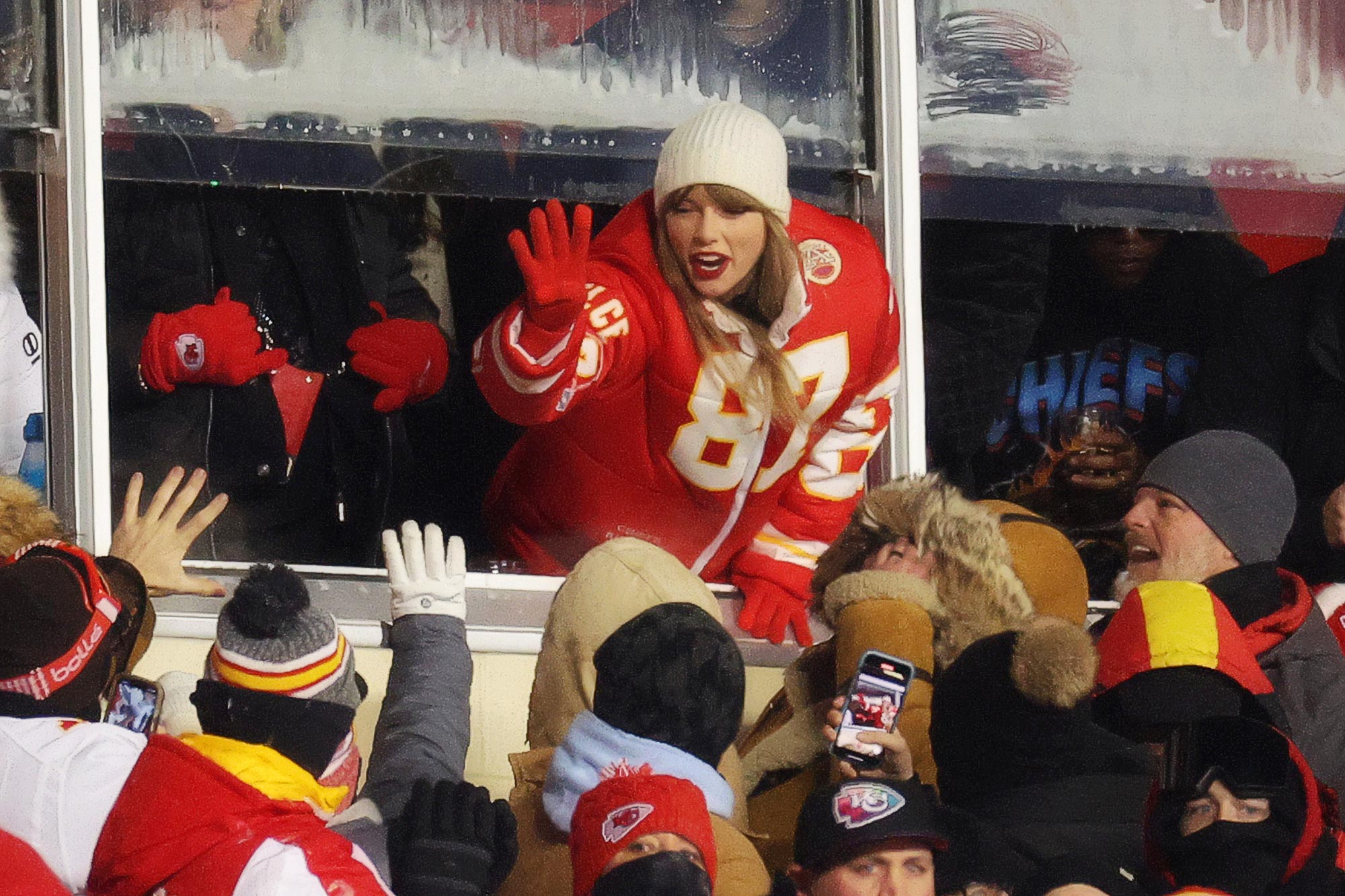 How Taylor Swift's Custom Travis Kelce Jersey Puffer Coat Was Made