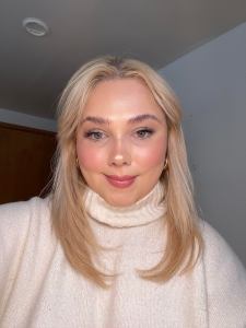 blonde haired woman wearing makeup