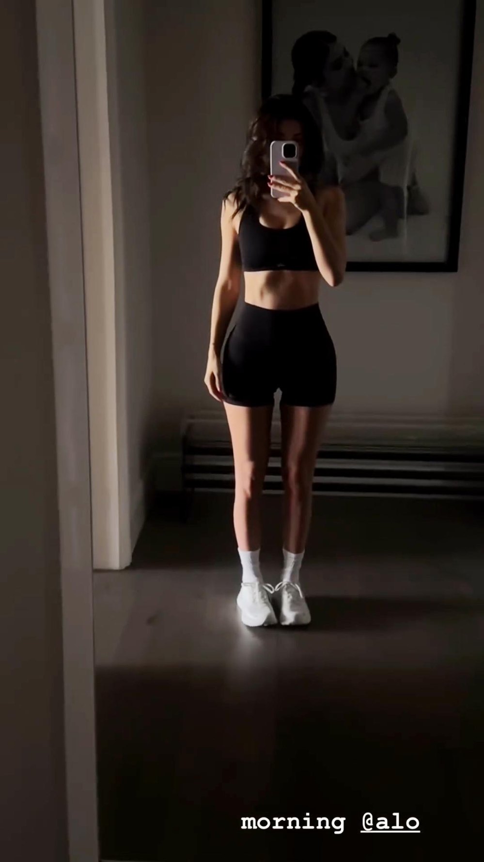 Kylie Jenner shows off her trim and sculpted figure in black Alo