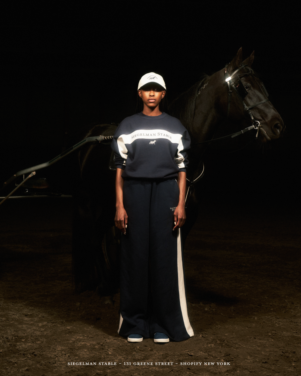Siegelman Stables Woman in Tracksuit with Hours