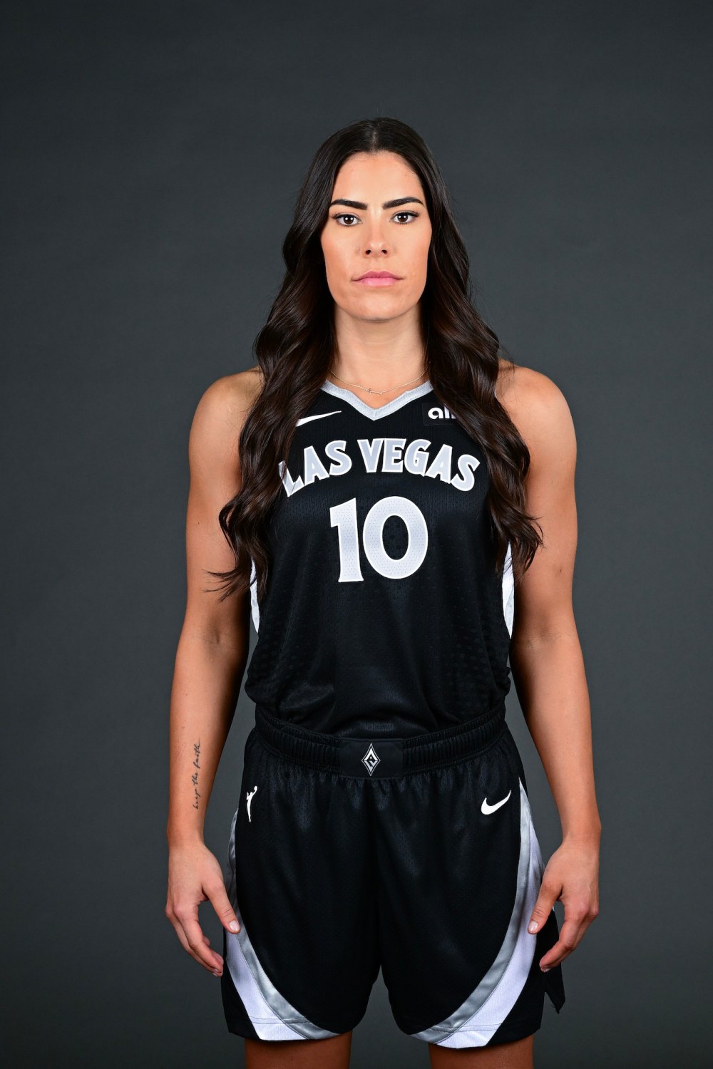 WNBA Star Kelsey Plum Goes Braless in Cropped Leather Vest at Season Opener in Las Vegas