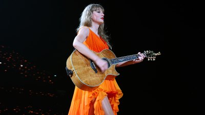 Taylor Swift estreia vestido laranja surpresa durante o terceiro show em Paris