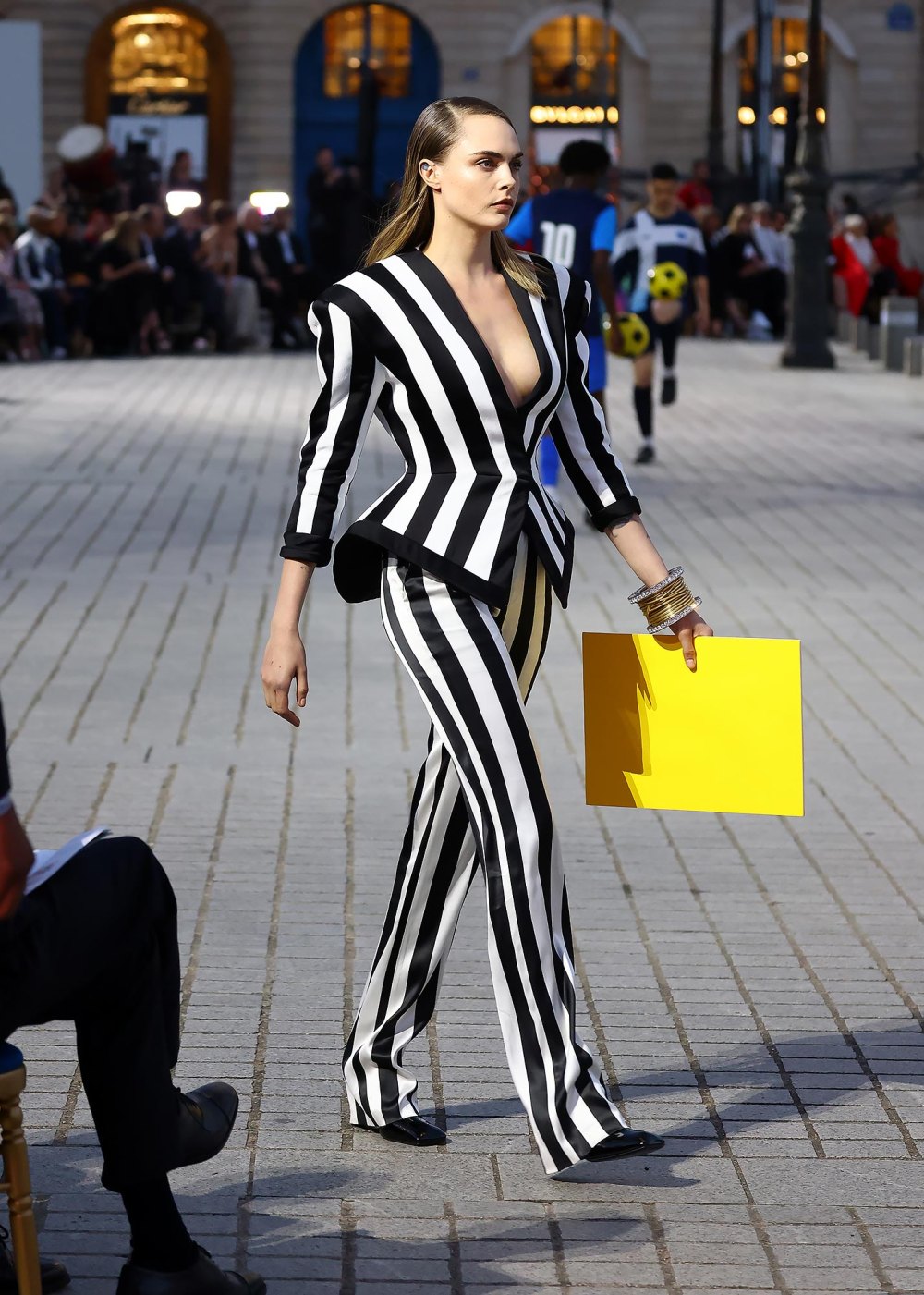 Cara Delevingne Wears Avant Garde Cone Bra Corset at Vogue World in Paris