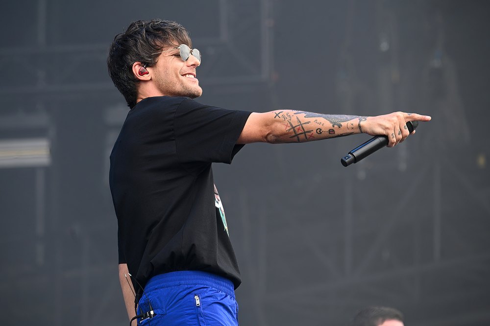 One Direction's Louis Tomlinson brought a TV to Glastonbury to watch the football match