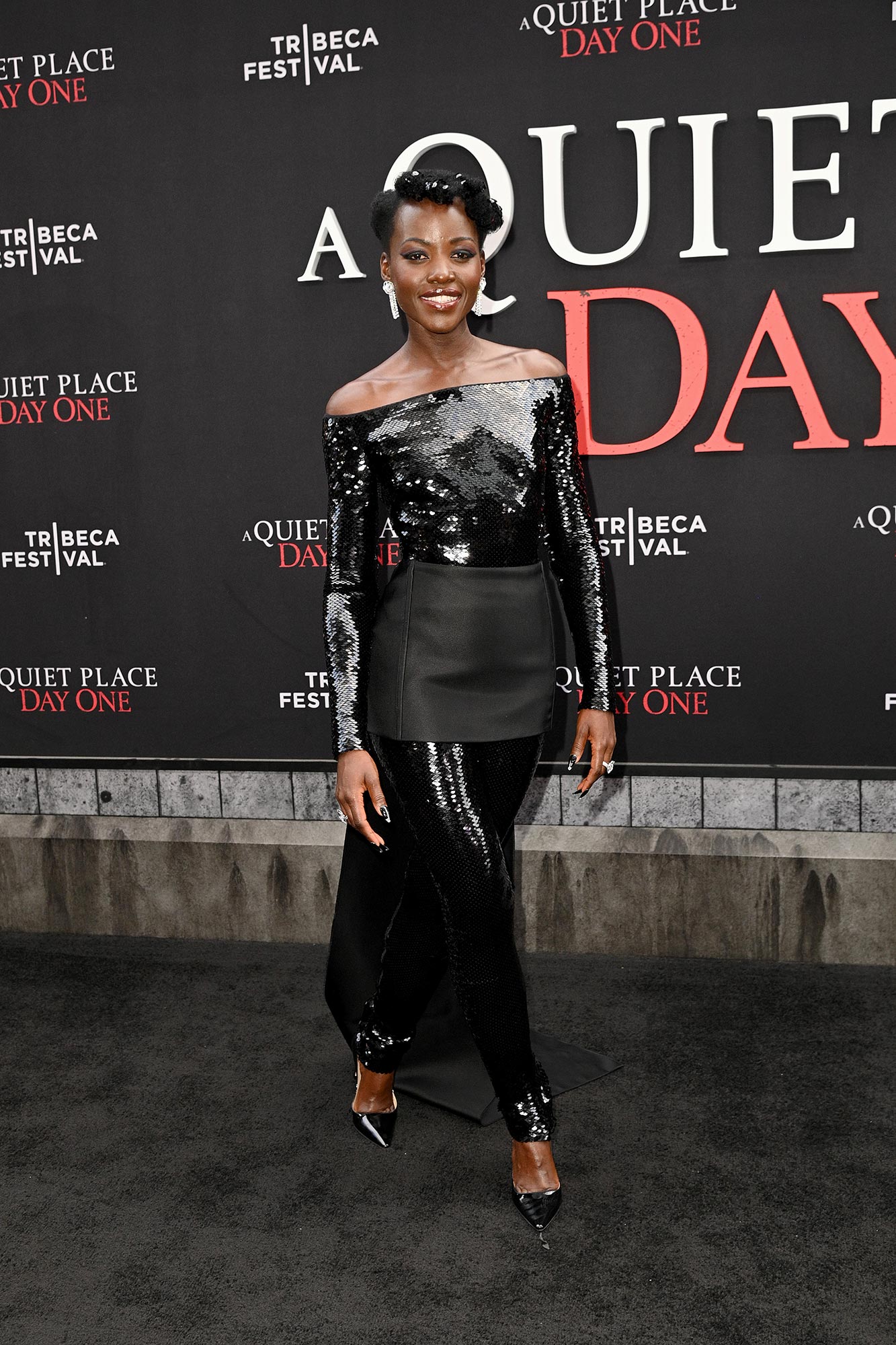 Lupita Nyong'o exala elegância misteriosa na estreia de 'A Quiet Place: Day One'