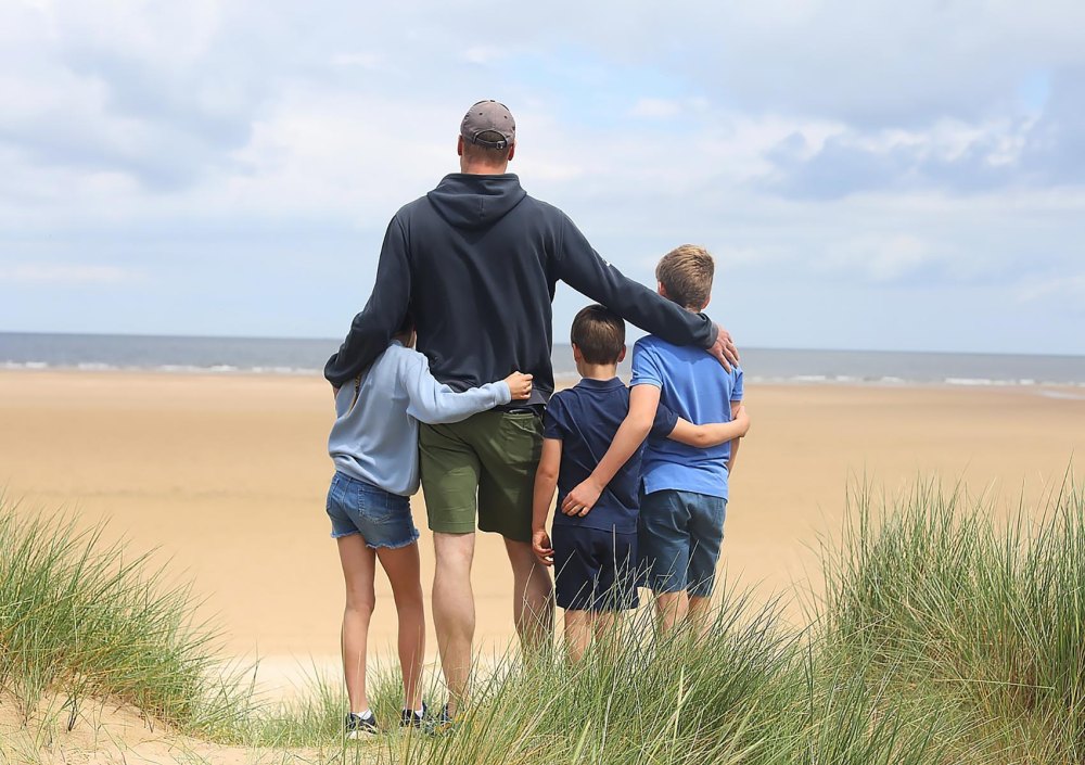 Prince William Poses With All 3 Kids at the Beach