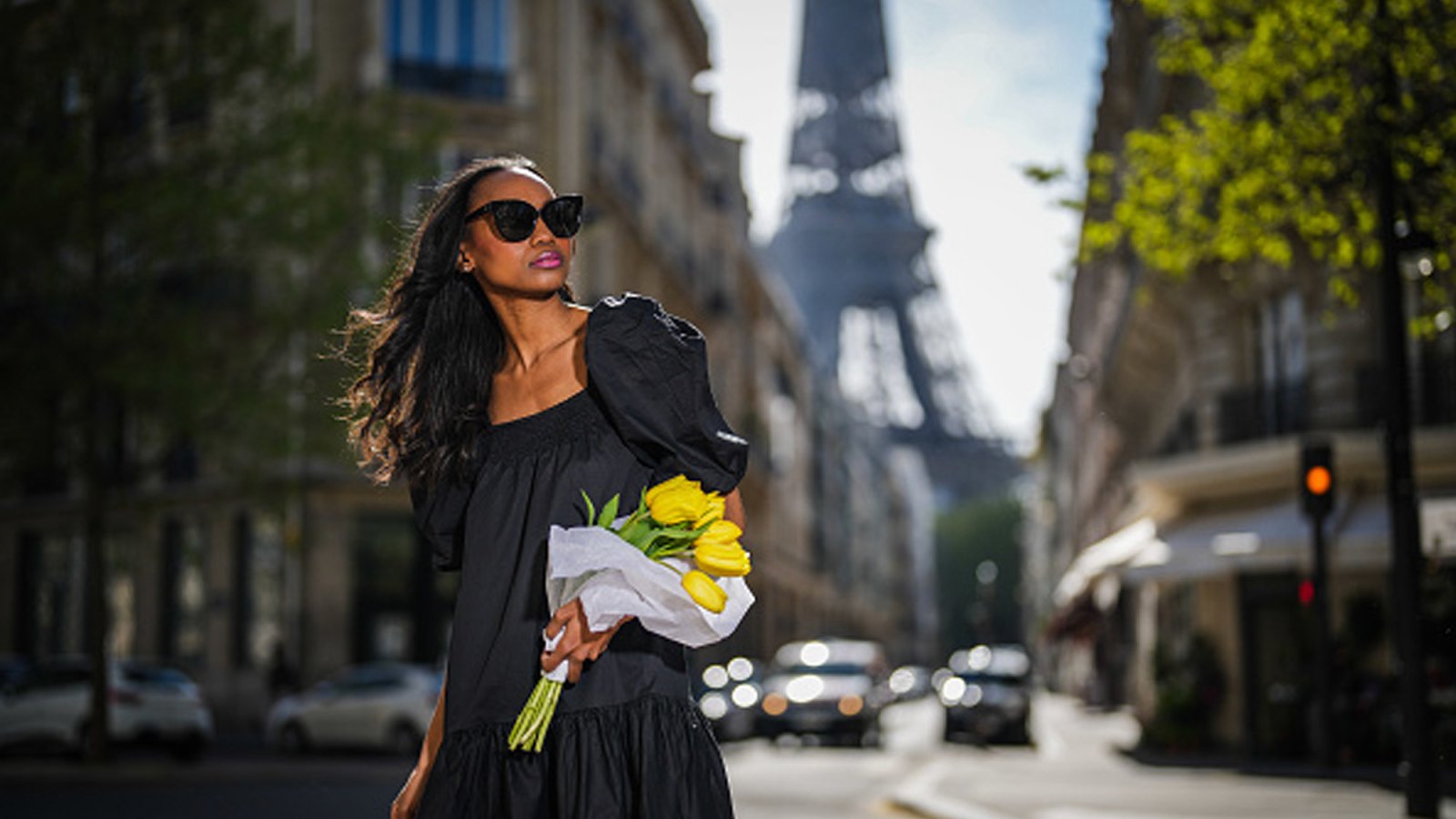 Woman wearing black summer dress