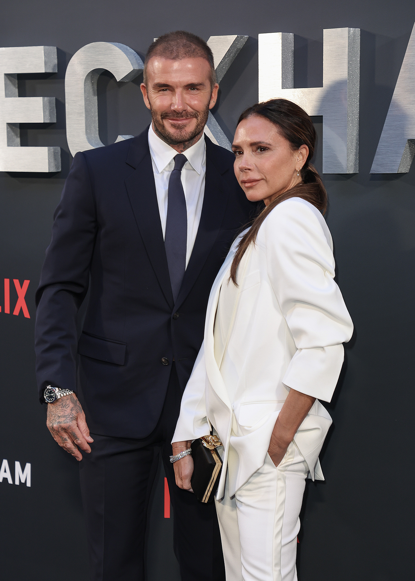 David and Victoria Beckham Rock Purple Wedding Outfits for 25th Anniversary