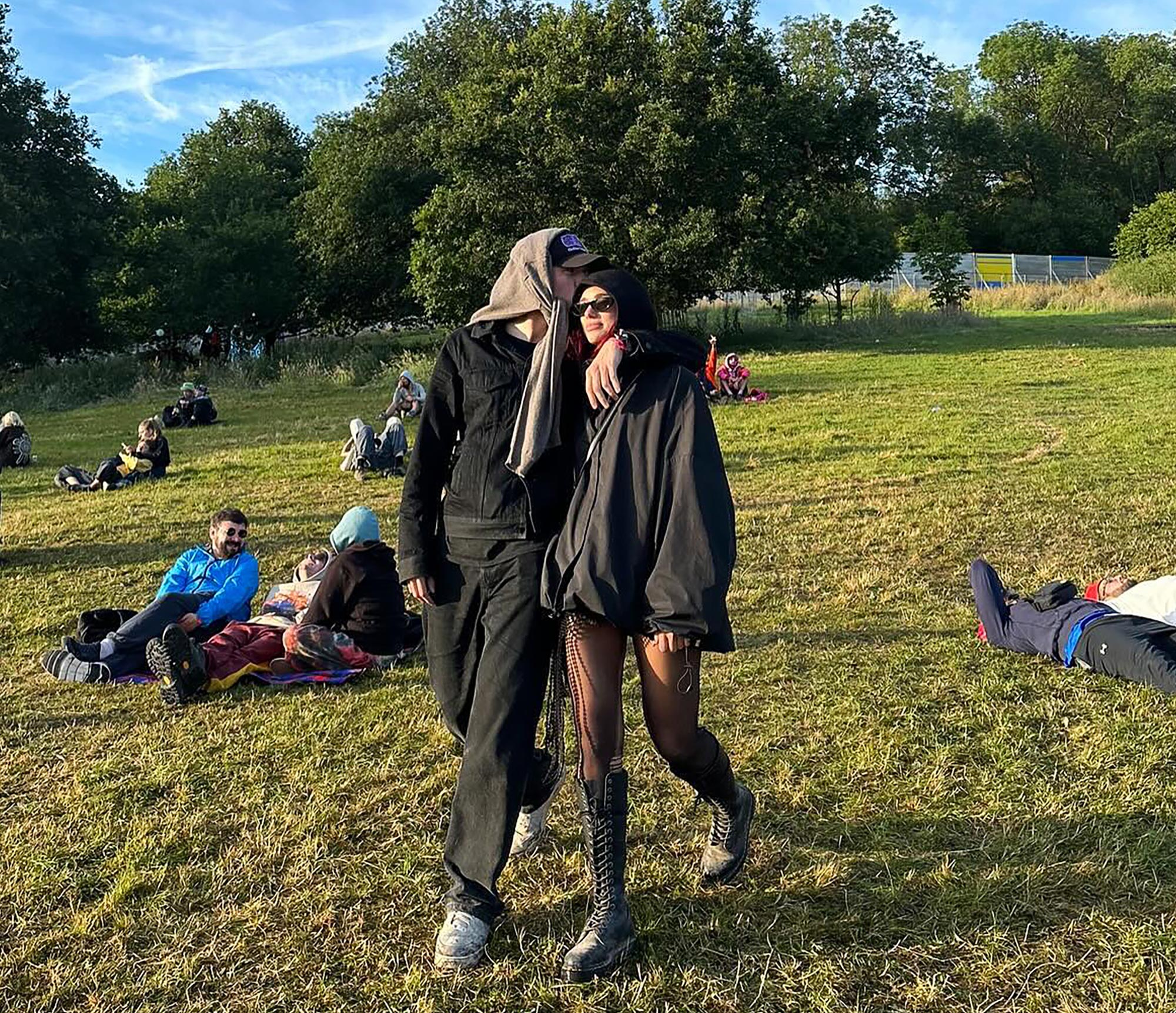 Dua Lipa and Callum Turner Cuddle Up in Cute Glastonbury Pics