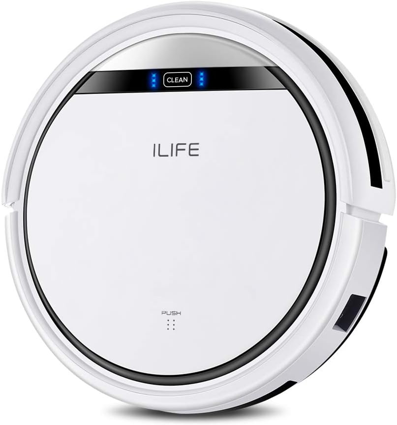 A white colored robot vacuum