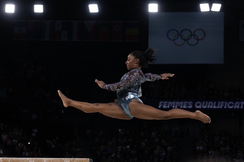 PARIS, FRANCE - JULY 28: Simone Biles of the United States performs her routine on the beam during the Women's Artistic Gymnastics Qualifiers on day two of the Olympic Games Paris 2024 at Bercy Arena on July 28, 2024 in Paris, France. (Photo by Steve Christo - Corbis/Corbis via Getty Images)