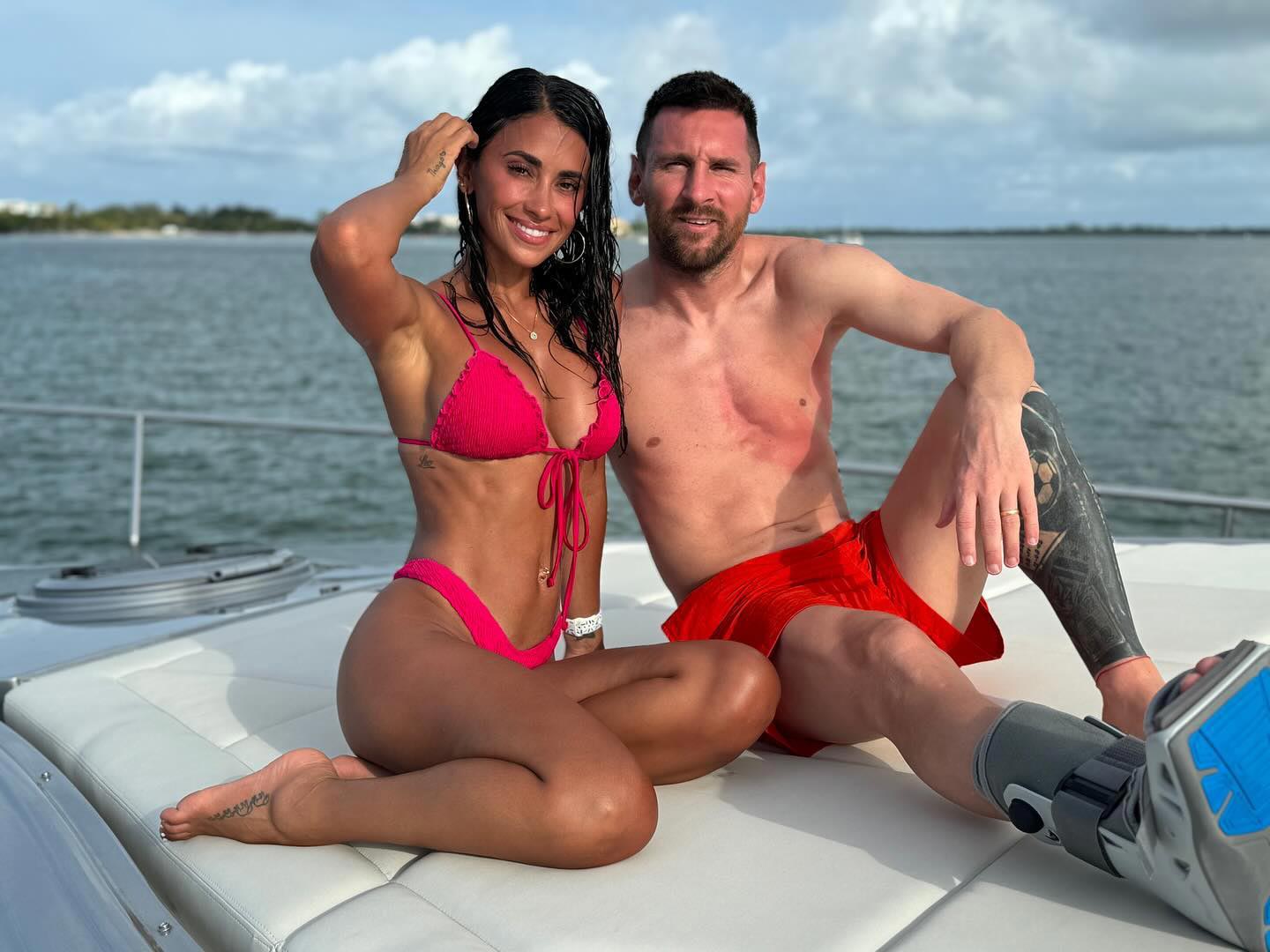 Shirtless Lionel Messi Shows Off Walking Boot Alongside Bikini-Clad Wife