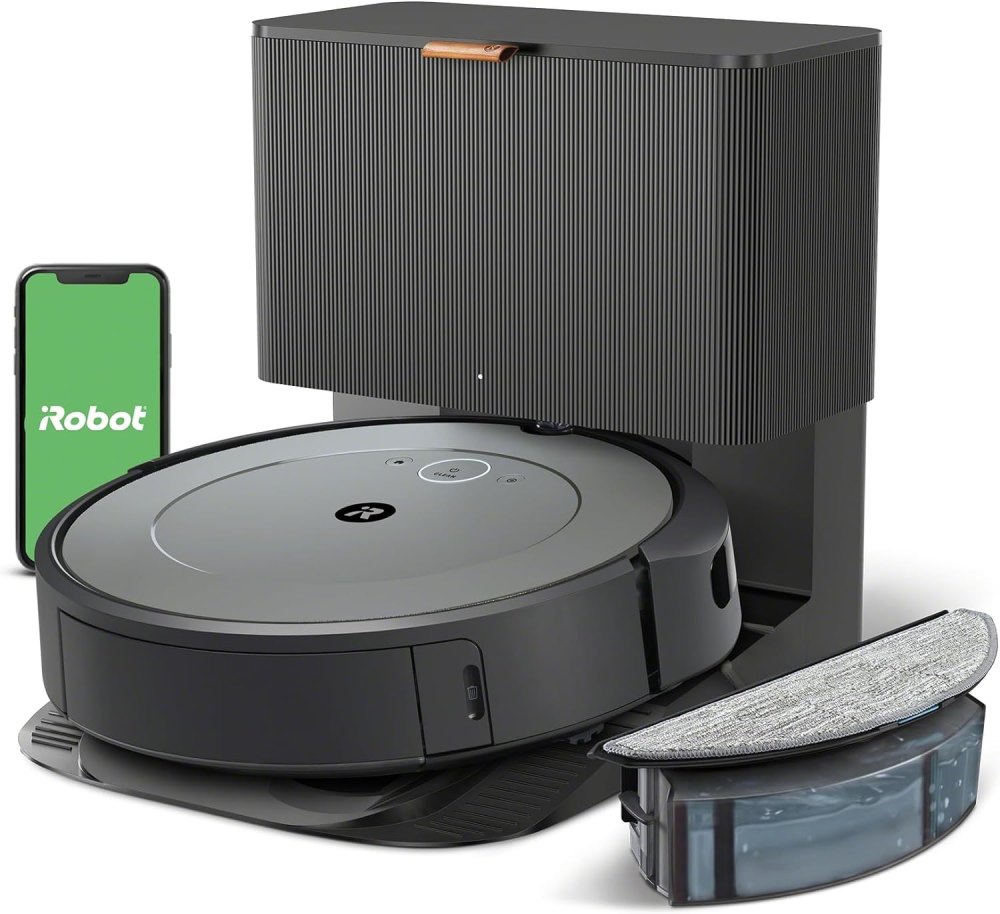 A combo set of a robot vacuum, charging station and phone.