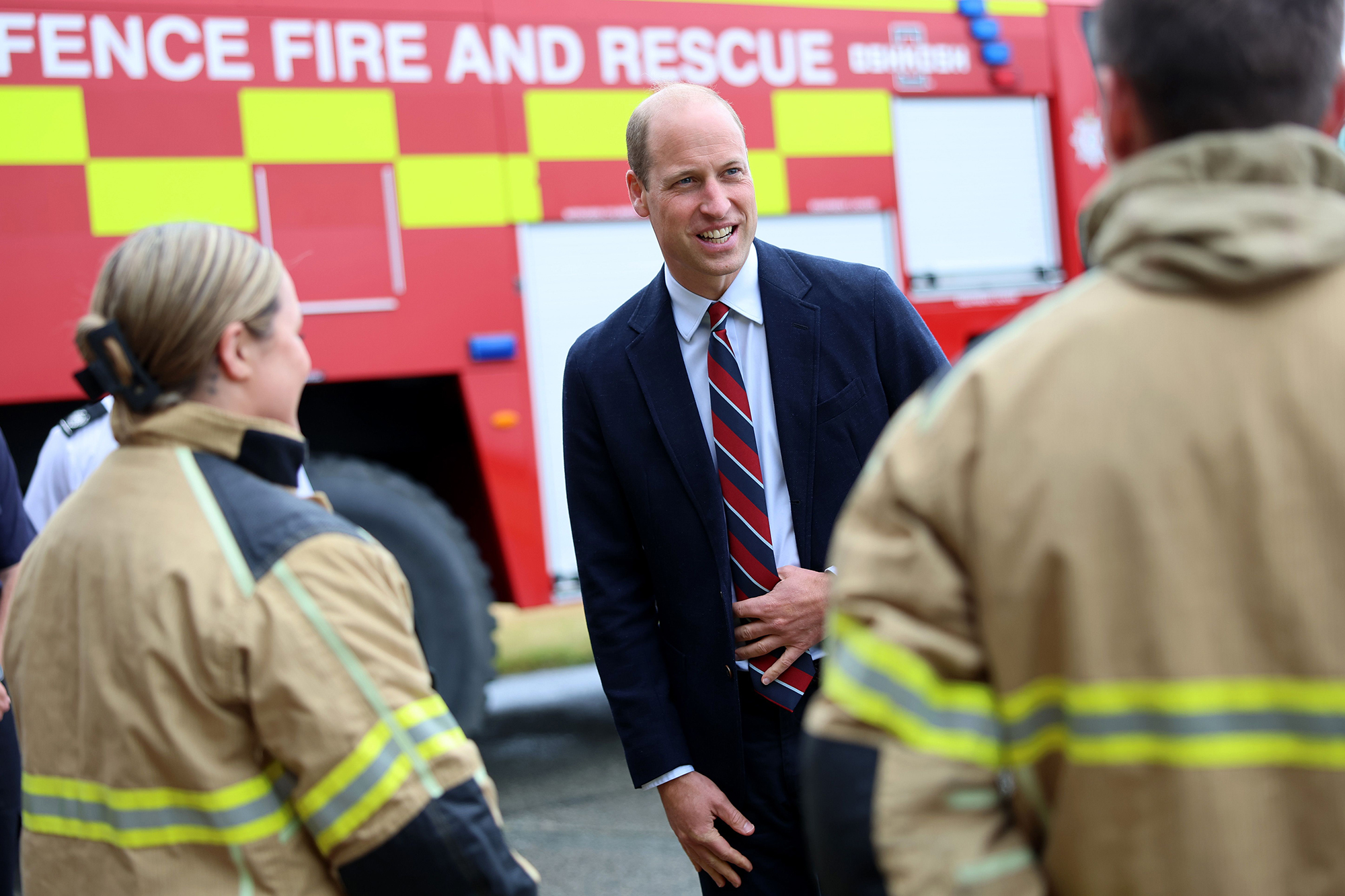 Prince William Laughs While Visiting City Where He Lived With Princess Kate