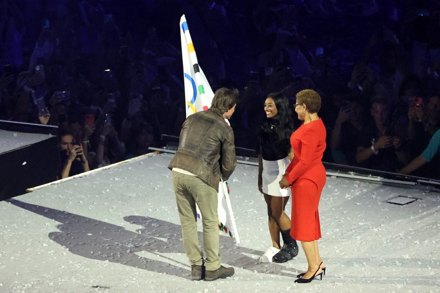 Tom Cruise at 2024 Paris Olympics Closing Ceremony with Simone Biles and Karen Bass.