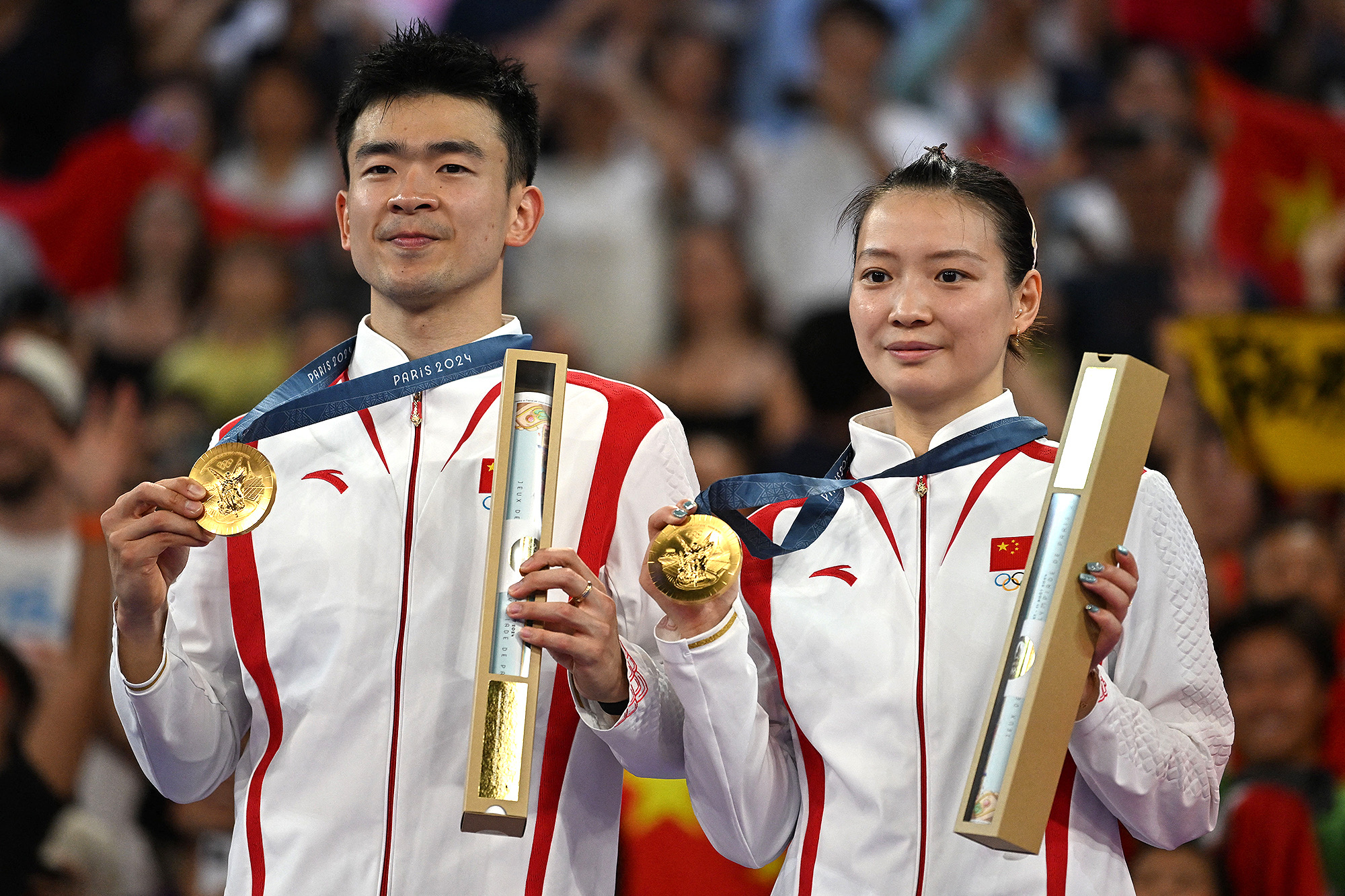 Chinesischer Olympiateilnehmer gewinnt Gold, kurz bevor der Freund seines Teamkollegen einen Heiratsantrag macht