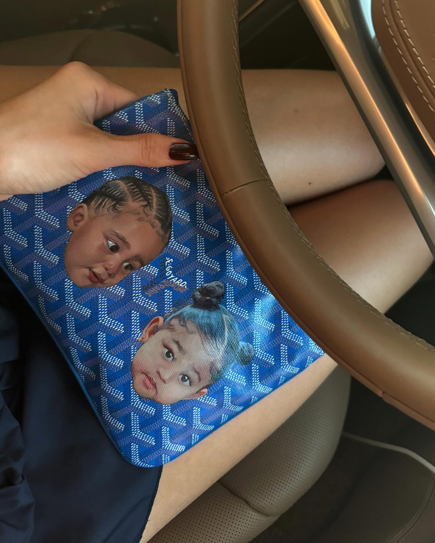 Kylie Jenner Shows Off Custom Purse Featuring Kids Stormi and Aire’s Faces