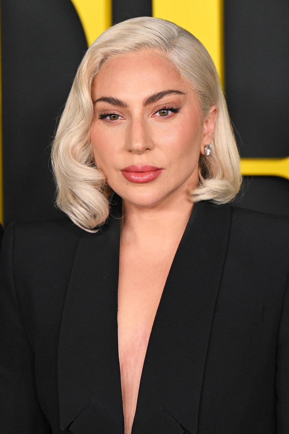 Lady Gaga leaves her typical blonde curls behind for a cool brunette makeover